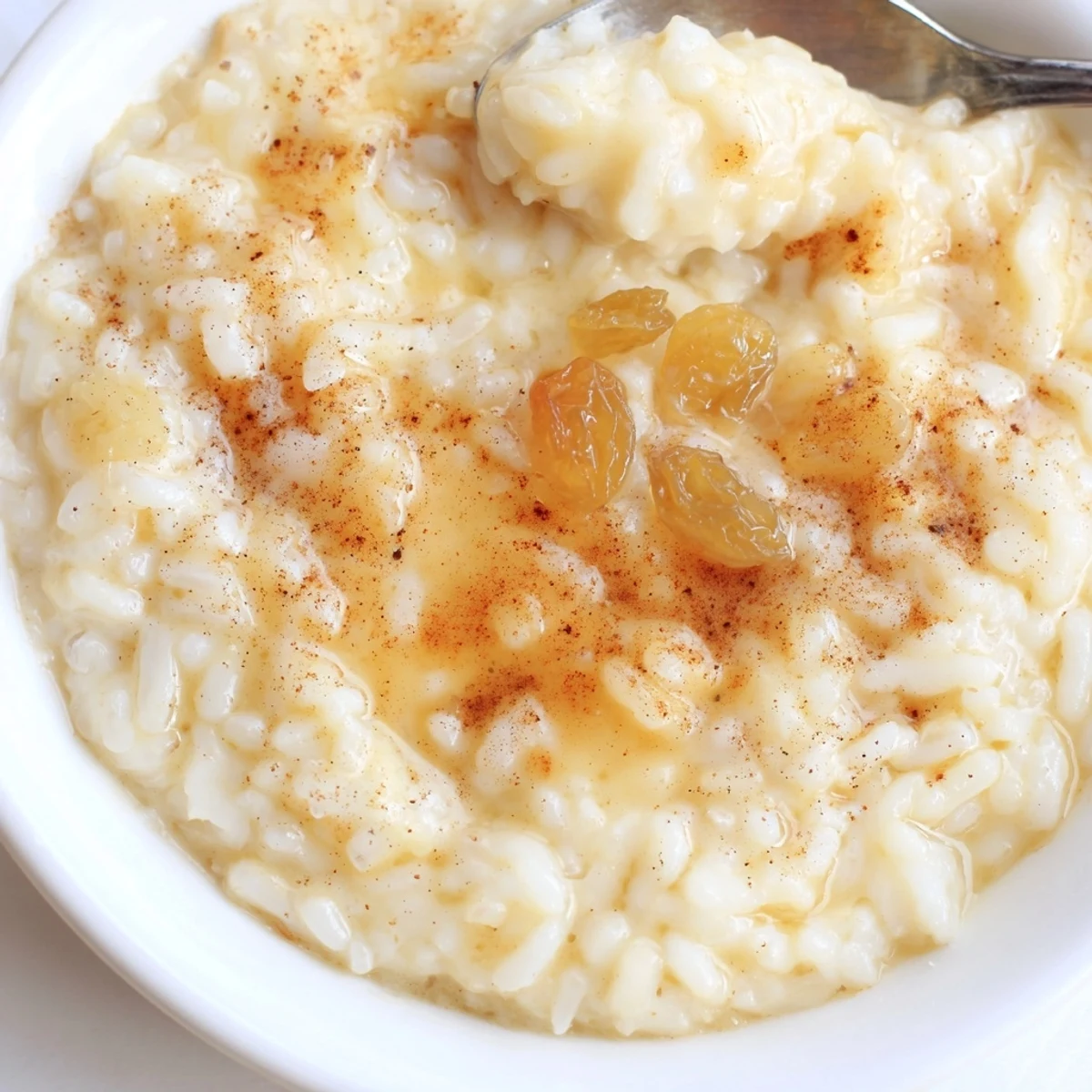 Delicious Condensed Milk Baked Rice Pudding Recipe To Try served chilled with fresh berries.