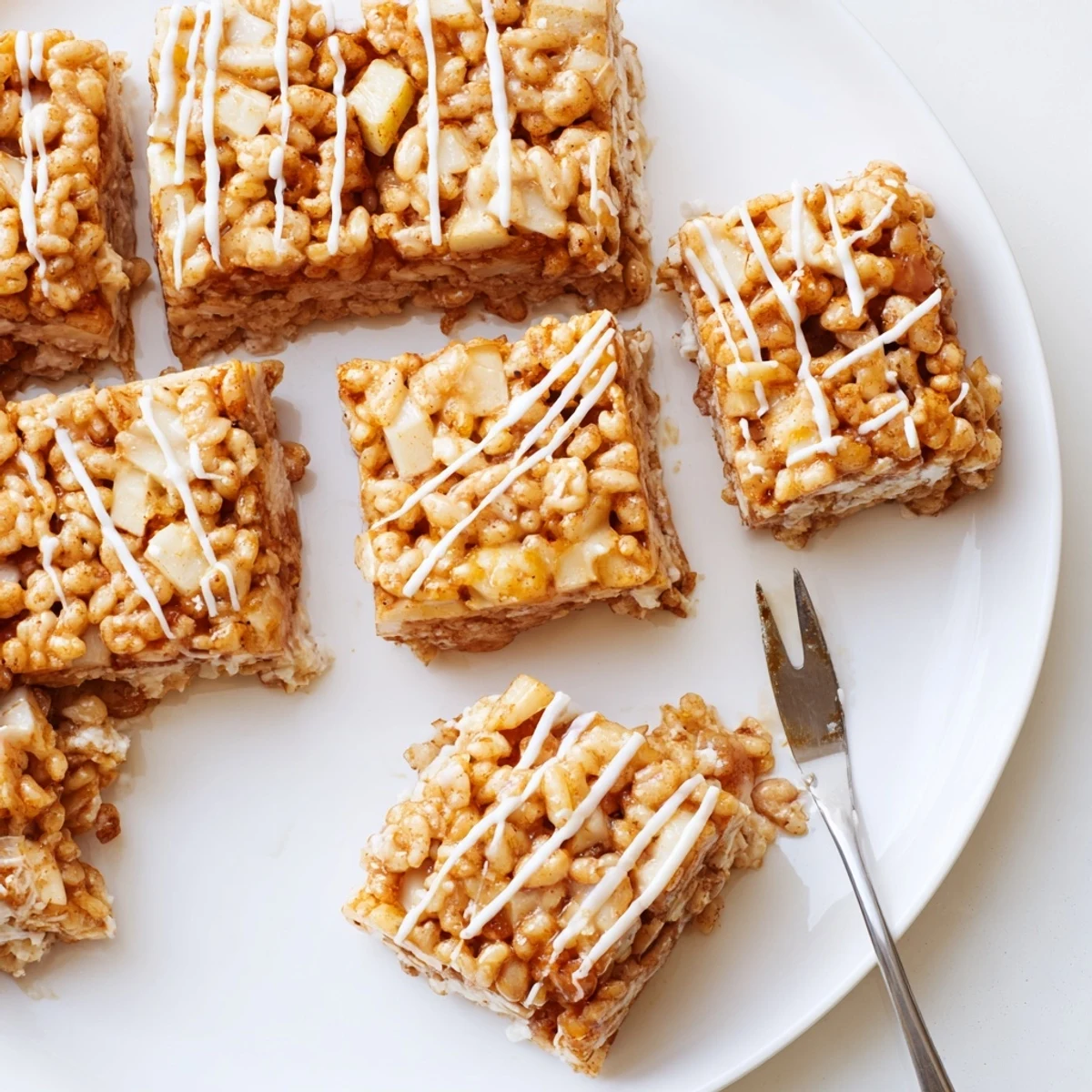 Chewy marshmallow Apple Pie Rice Krispie Treats studded with warm cinnamon spiced apples