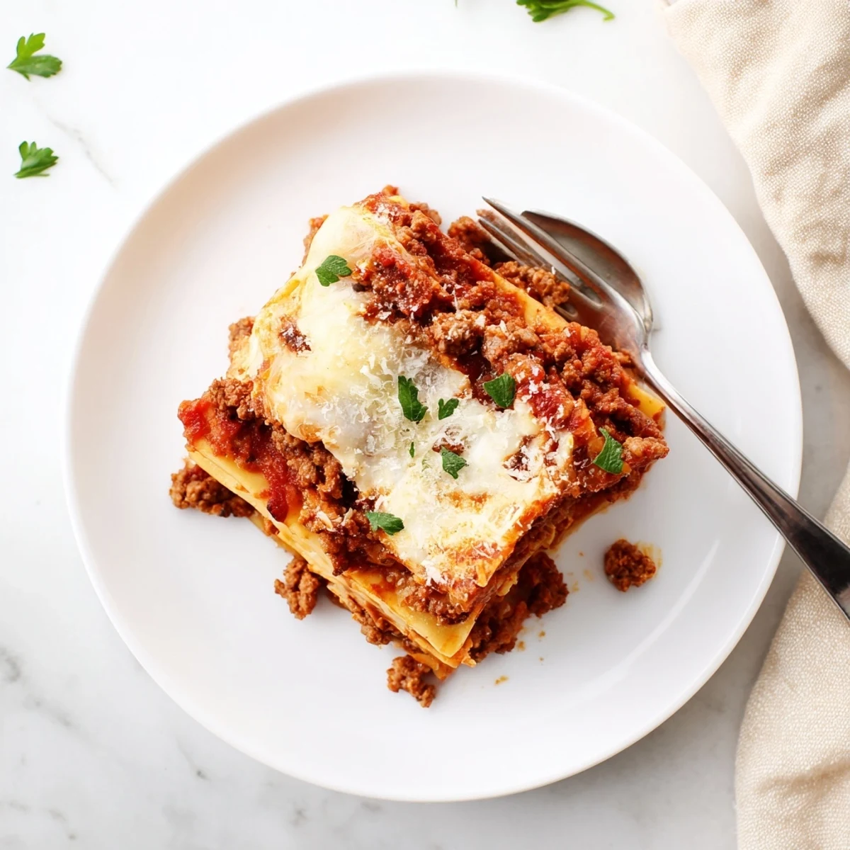 Slow Cooker Lasagna bubbling with melted mozzarella, tender noodles and savory meat sauce