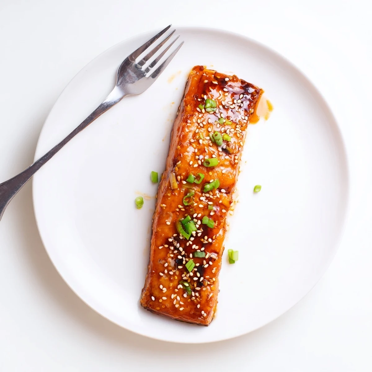 Baked Teriyaki Salmon with glossy teriyaki glaze, tender flaky flesh, ready