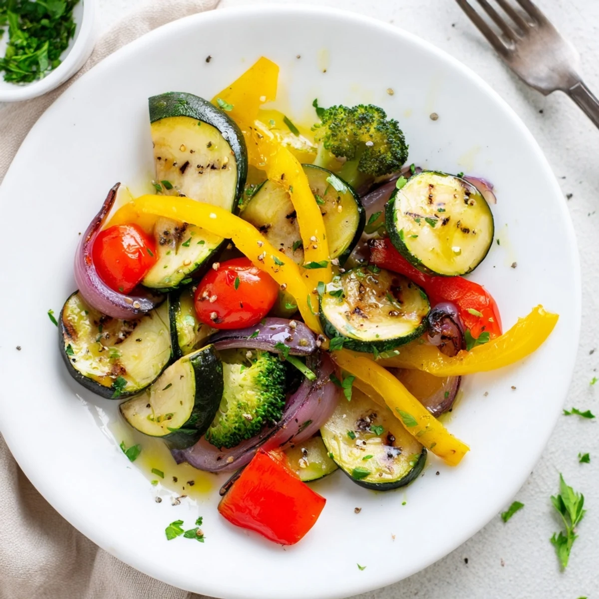 Bright Garlic Infused Olive Oil Sauteed Veggies with charred bell peppers, juicy tomatoes
