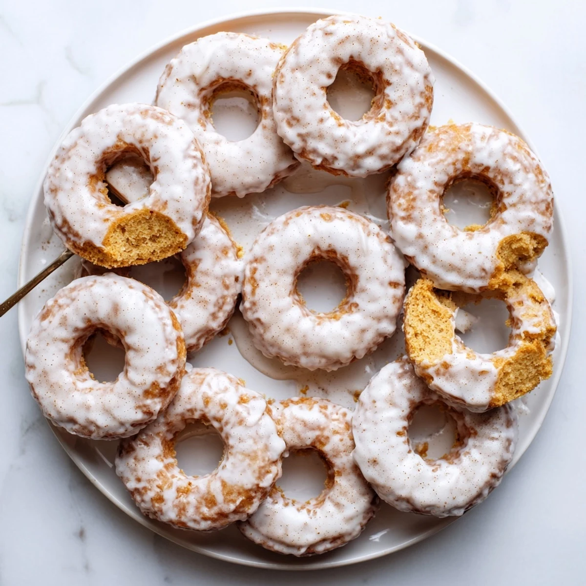 Moist banana bread donuts with sweet glaze ready for breakfast or dessert