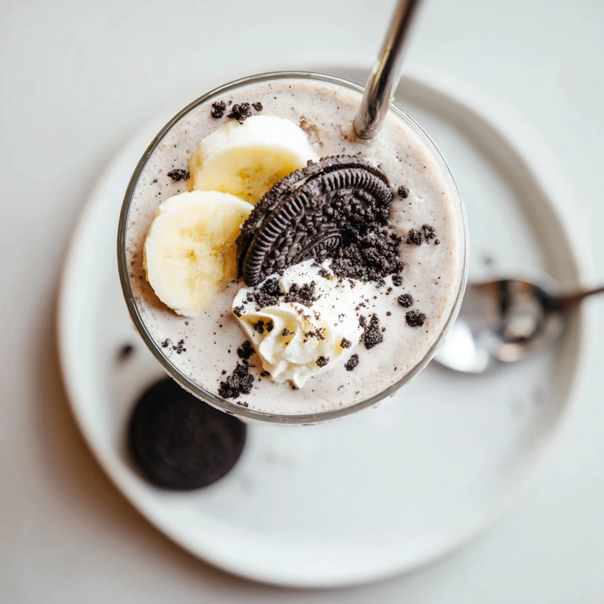 Creamy Cookies And Cream Protein Shake with crushed cookie crumbs, cold and thick