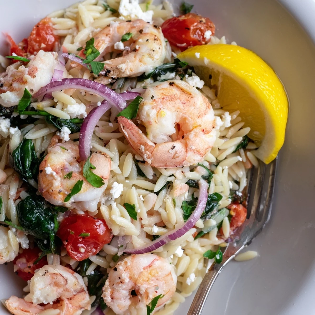 Bright Lemon Feta Orzo Shrimp Recipe served hot with parsley garnish.