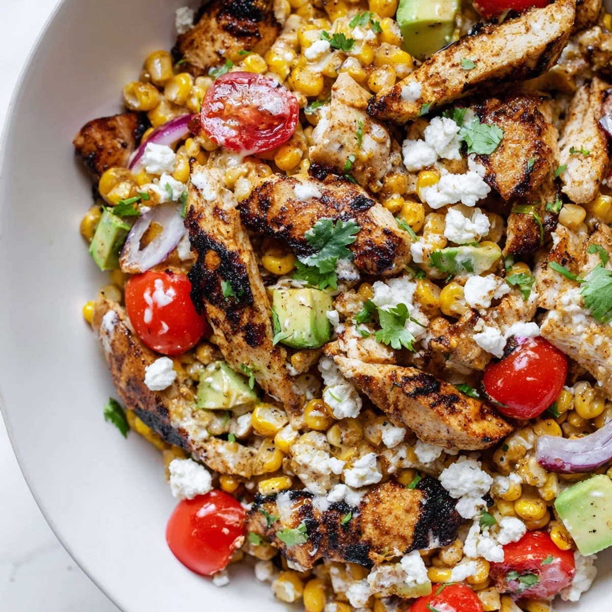 High protein chicken street corn salad with charred kernels and fresh cilantro