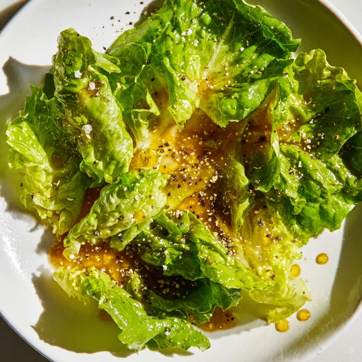 Smooth honey vinaigrette dressing whisked to perfection in a glass jar for salads.  
