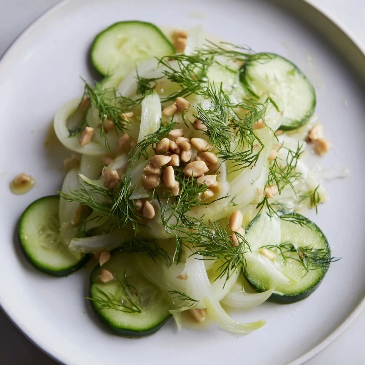 Fresh crisp fennel cucumber salad tossed in zesty citrus dressing with dill  